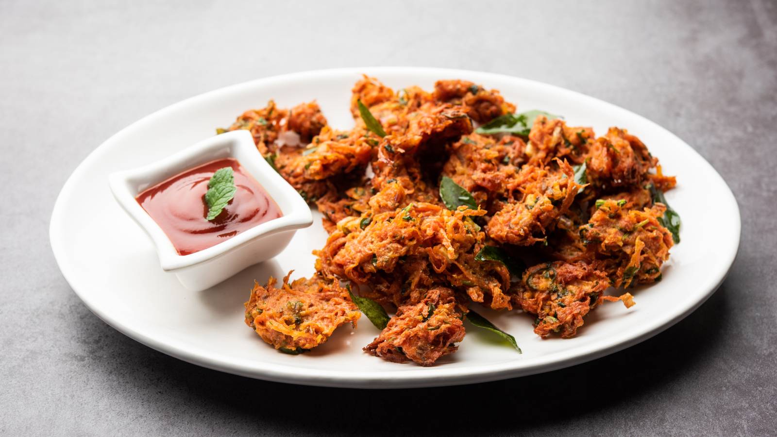 English Name of Pakora: लोग बारिश में पकौड़े खाते हैं, लेकिन क्या आप जानते हैं इसका अंग्रेजी नाम? जापान में इसे अनोखे नाम से जाना जाता है।